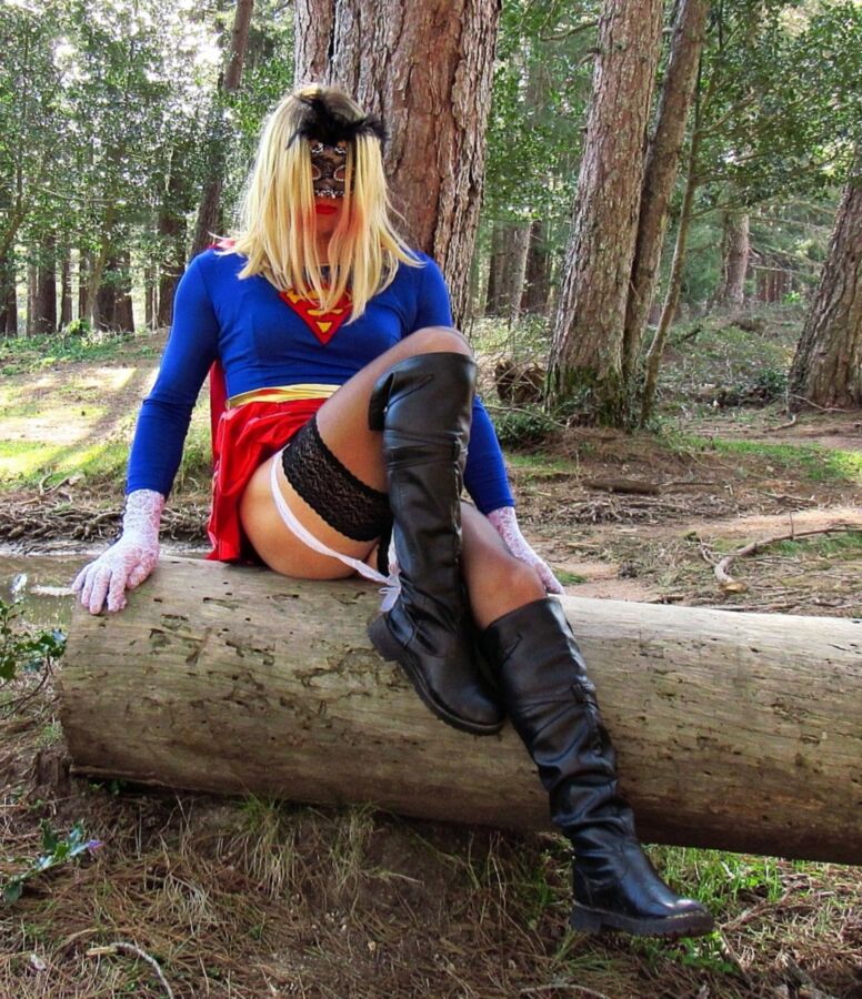 Free porn pics of Sexy Superwoman in stockings and boots, without panties cosplay  8 of 19 pics