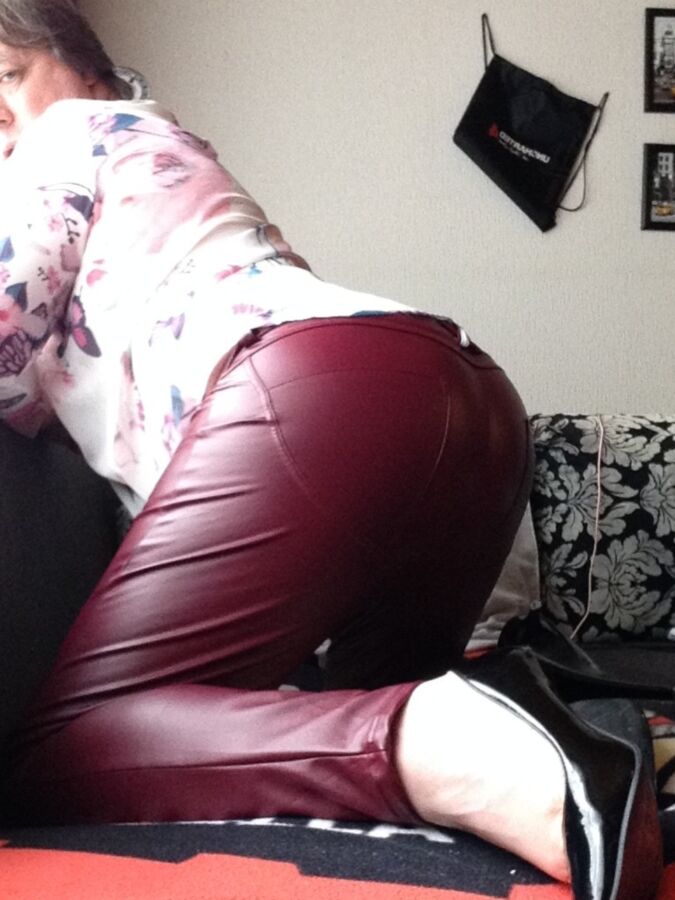 Posing in red leatherlook pants 23 of 35 pics