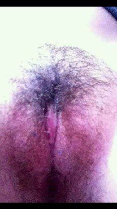 Horny teen exposing her hairy pussy and big tits 1 of 2 pics