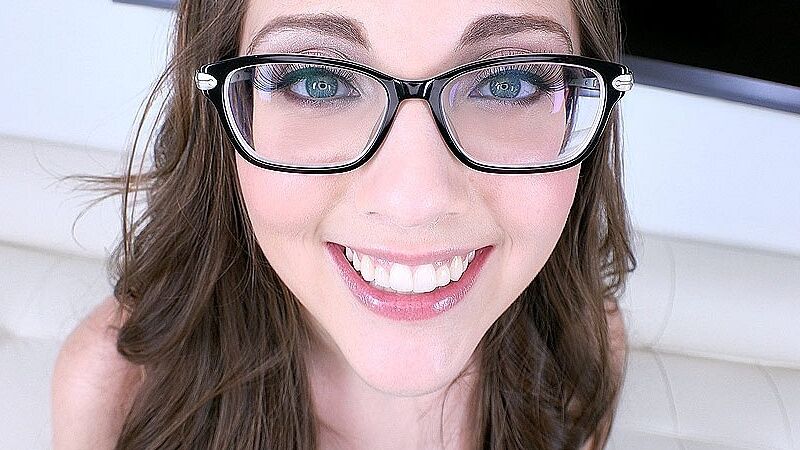 alluring grinning girl in glasses sucks your soul into her eyes 5 of 45 pics