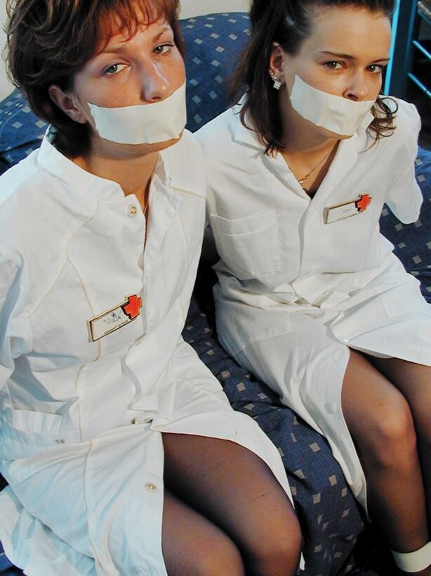 Two cute nurses tied up and gagged 3 of 75 pics