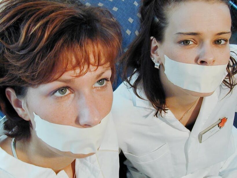 Two cute nurses tied up and gagged 10 of 75 pics