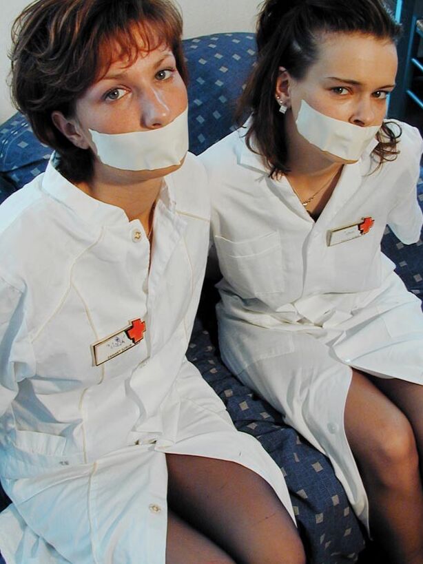 Two cute nurses tied up and gagged 4 of 75 pics