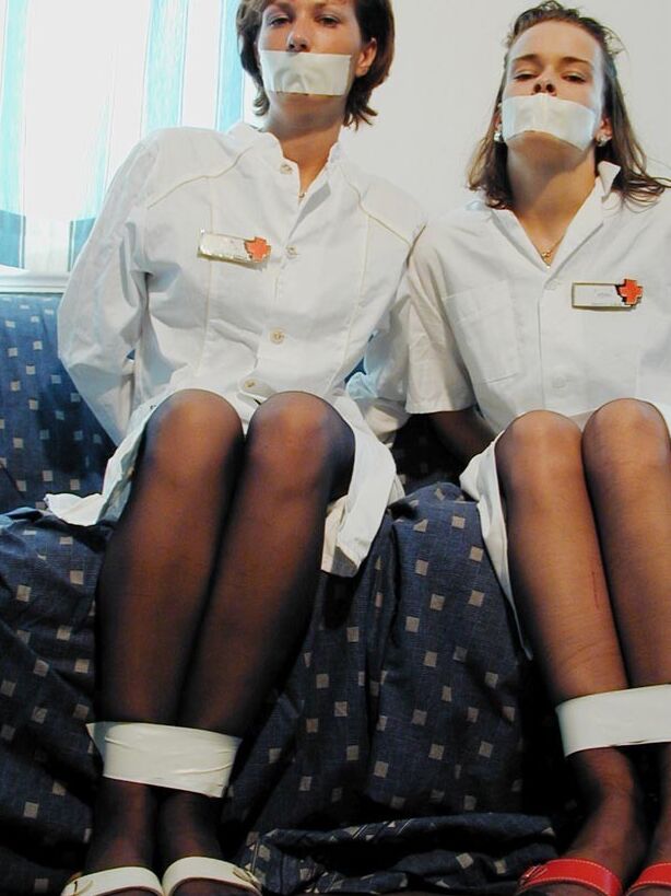 Two cute nurses tied up and gagged 7 of 75 pics.