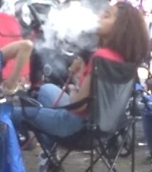 Teen Hookah Smoker Latina Girl at Parade 14 of 18 pics