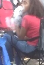 Teen Hookah Smoker Latina Girl at Parade 10 of 18 pics