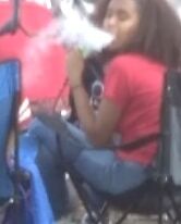 Teen Hookah Smoker Latina Girl at Parade 17 of 18 pics