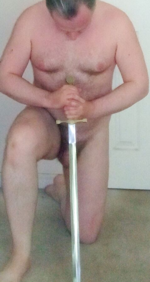 Naked Submissive Male Warrior with a Sword 1 of 1 pics