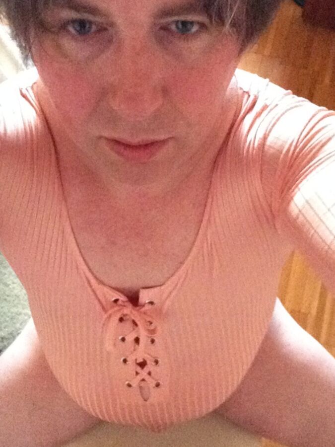 Flashing in a pink bodysuit 11 of 53 pics