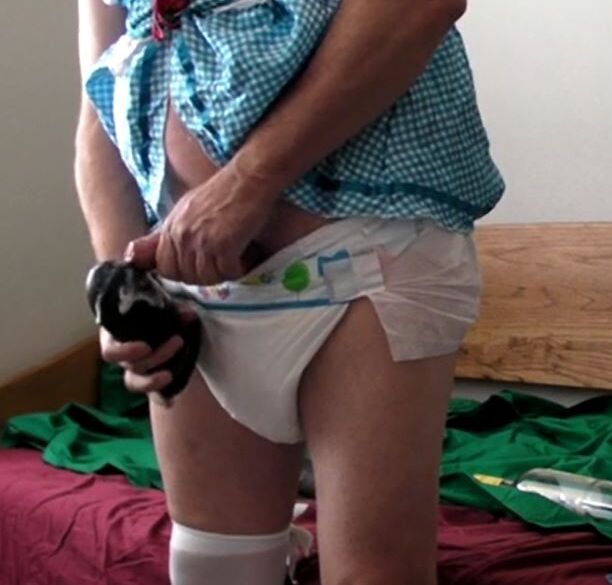 ABDL sissy diaper boy cumming on buttplug 4 of 5 pics