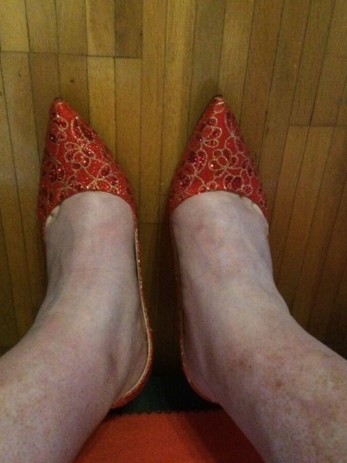 A new pair of red pumps 2 of 25 pics