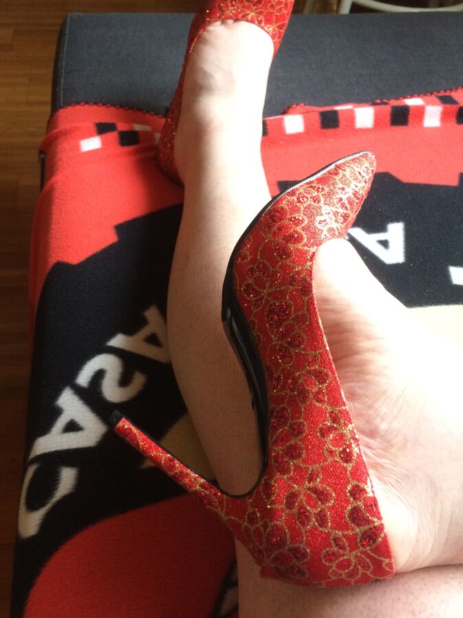 A new pair of red pumps 11 of 25 pics