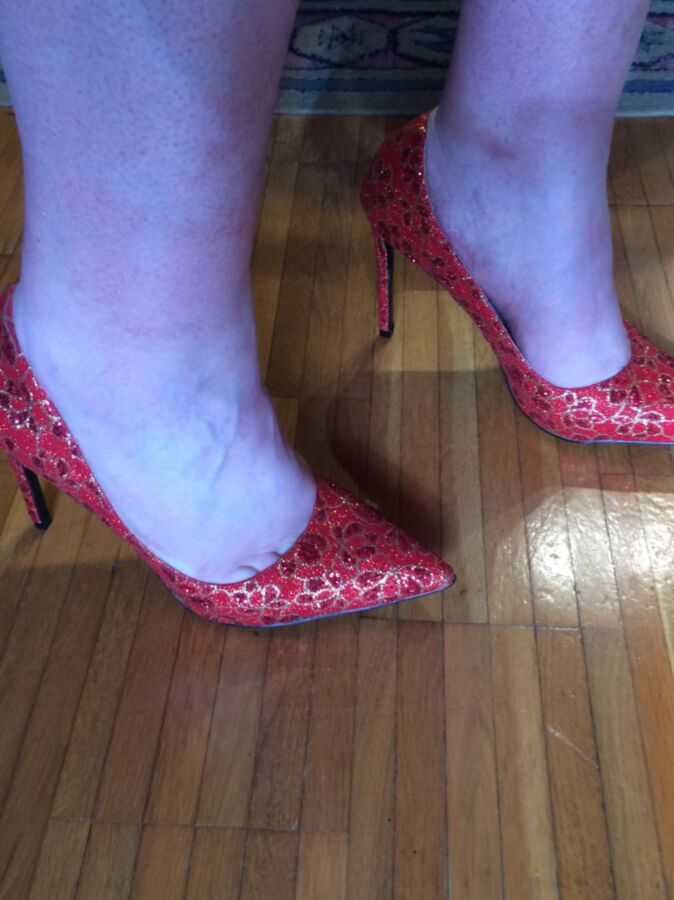 A new pair of red pumps 1 of 25 pics