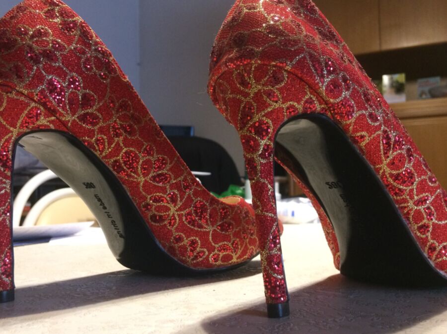 A new pair of red pumps 21 of 25 pics