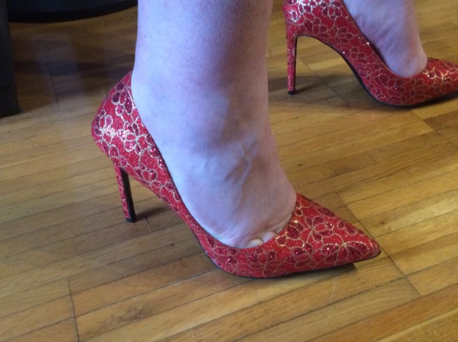 A new pair of red pumps 16 of 25 pics