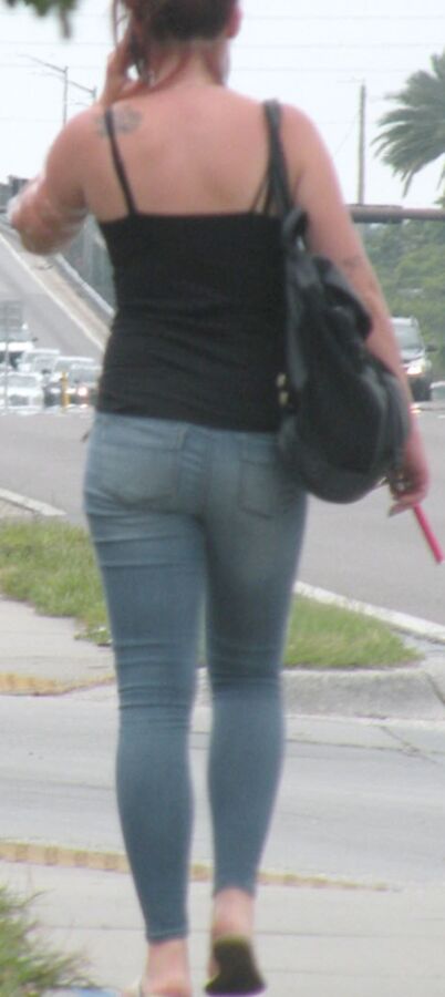 Skinny FL hooker in jeans, tiny little belly TIGHT JEANS redhead 4 of 5 pics