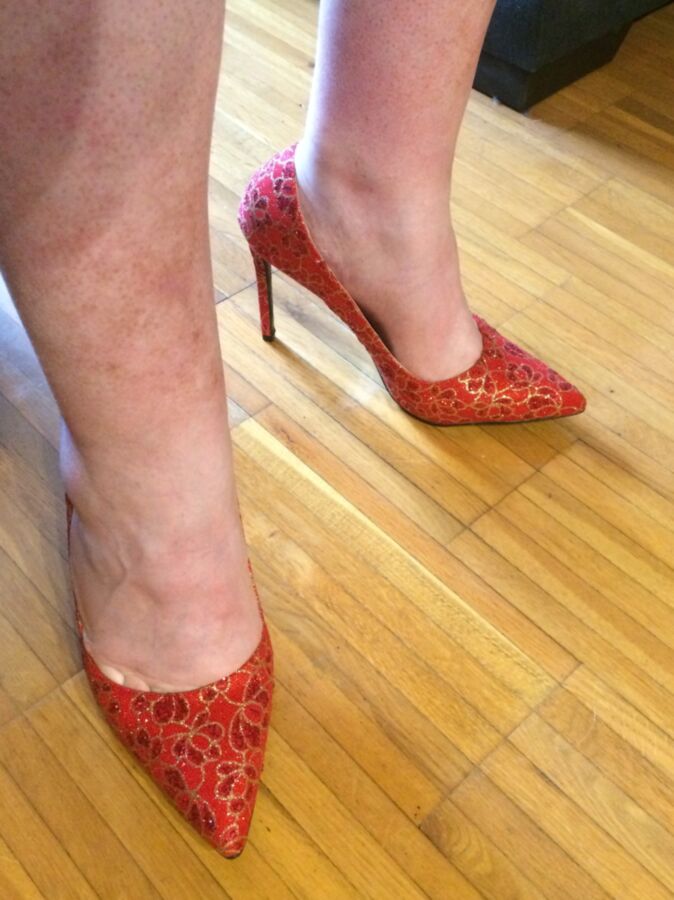 A new pair of red pumps 14 of 25 pics