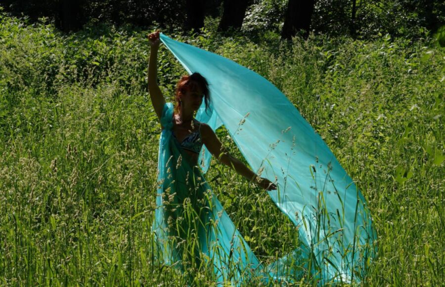 With a turquoise veil in the contrlight 24 of 57 pics