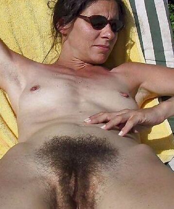 Very hairy, mature, slim French MILF over time 9 of 12 pics
