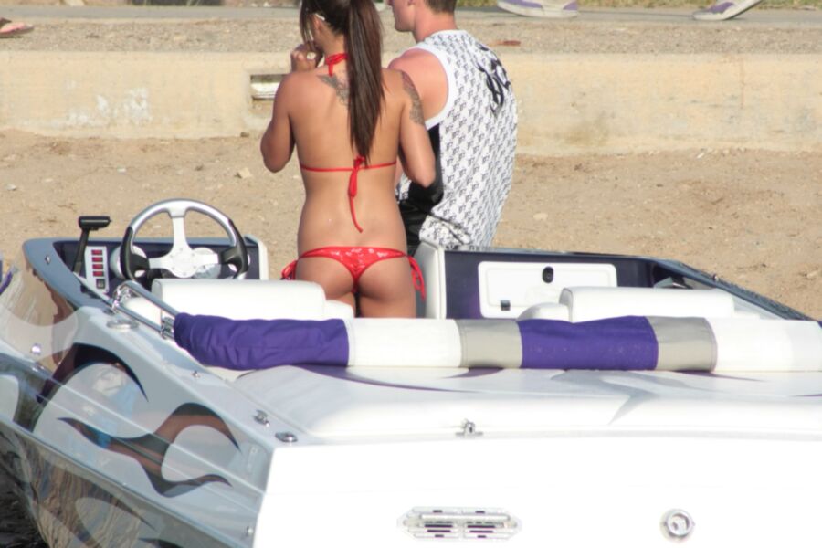 Brunette in Red Thong Bikini 3 of 39 pics