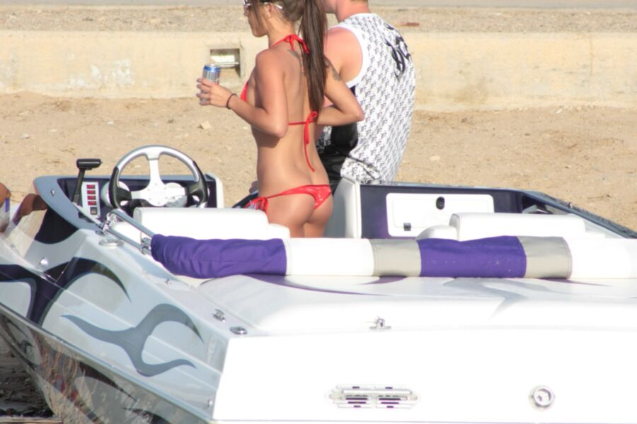 Brunette in Red Thong Bikini 5 of 39 pics