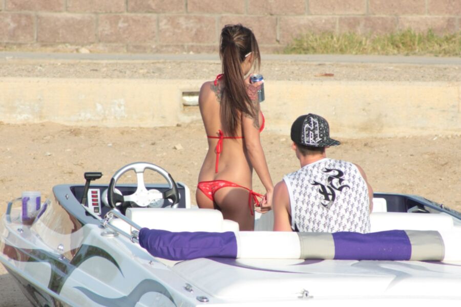 Brunette in Red Thong Bikini 9 of 39 pics