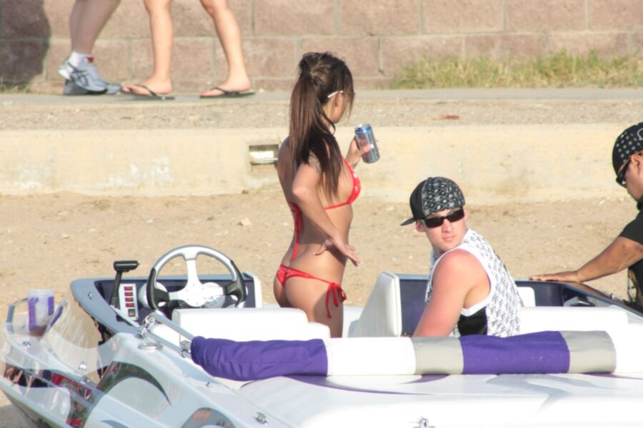 Brunette in Red Thong Bikini 22 of 39 pics