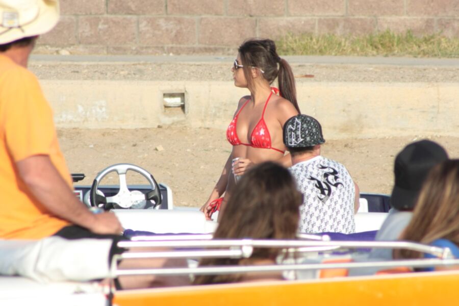 Brunette in Red Thong Bikini 14 of 39 pics