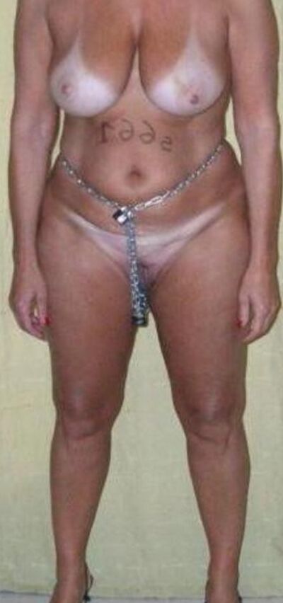 Busty Mature slavemeat in chains 4 of 5 pics