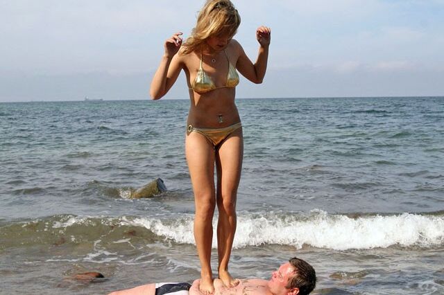 Young Femdom Girl Nadja at the Beach with Slave Gunnar 8 of 9 pics