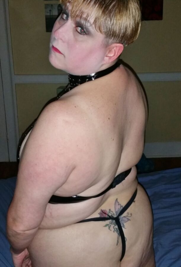 Sexy Short Haired Wife Ball Gagged In Leather 1 of 8 pics