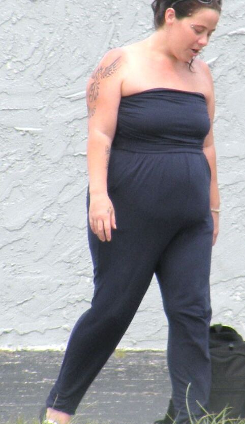 A catsuit and a huge belly--preggo or fat...either way...HOT BBW 19 of 28 pics