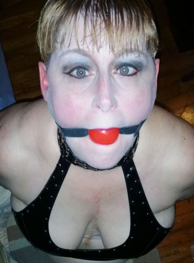 Sexy Short Haired Wife Ball Gagged In Leather 4 of 8 pics