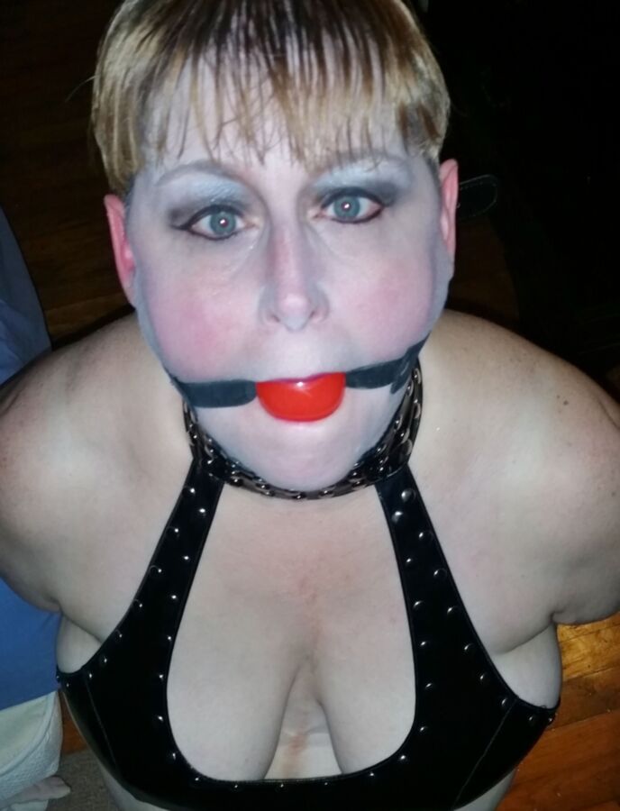 Sexy Short Haired Wife Ball Gagged In Leather 5 of 8 pics