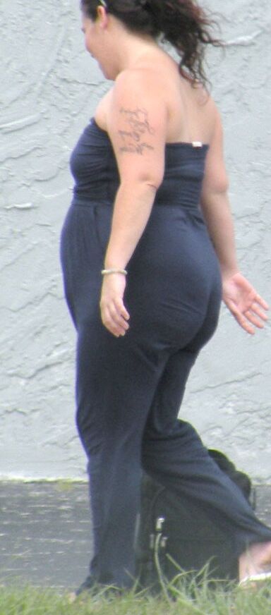 A catsuit and a huge belly--preggo or fat...either way...HOT BBW 22 of 28 pics