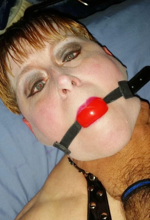 Sexy Short Haired Wife Ball Gagged In Leather 6 of 8 pics