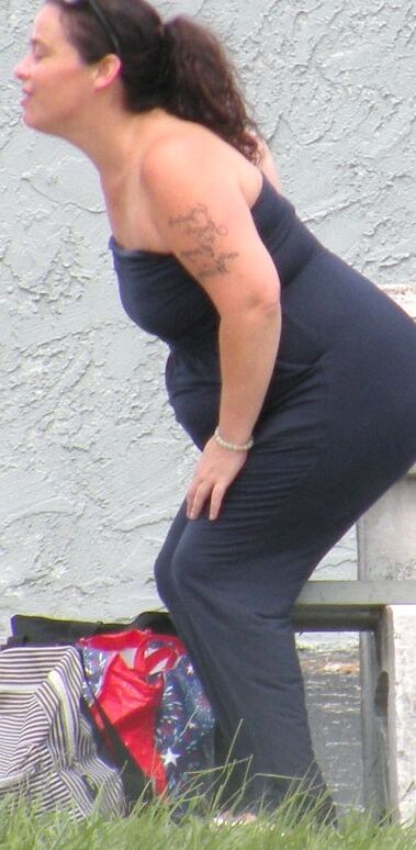 A catsuit and a huge belly--preggo or fat...either way...HOT BBW 18 of 28 pics