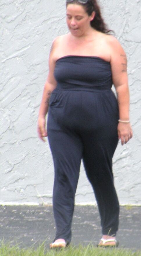 A catsuit and a huge belly--preggo or fat...either way...HOT BBW 1 of 28 pics