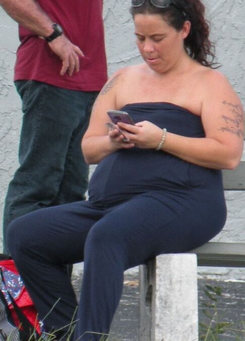 A catsuit and a huge belly--preggo or fat...either way...HOT BBW 7 of 28 pics