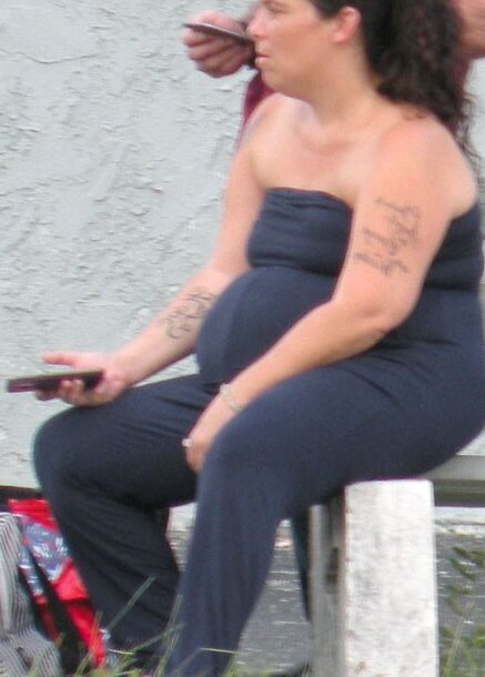 A catsuit and a huge belly--preggo or fat...either way...HOT BBW 12 of 28 pics