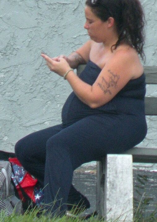 A catsuit and a huge belly--preggo or fat...either way...HOT BBW 5 of 28 pics