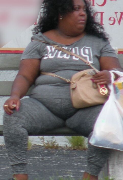 Ebony BBW with a big belly and TIGHT OUTFIT Ball Buster HOT 7 of 14 pics