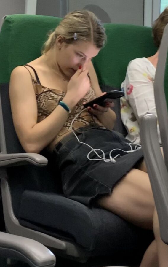 Tight Skirt Blonde on Train 18 of 34 pics