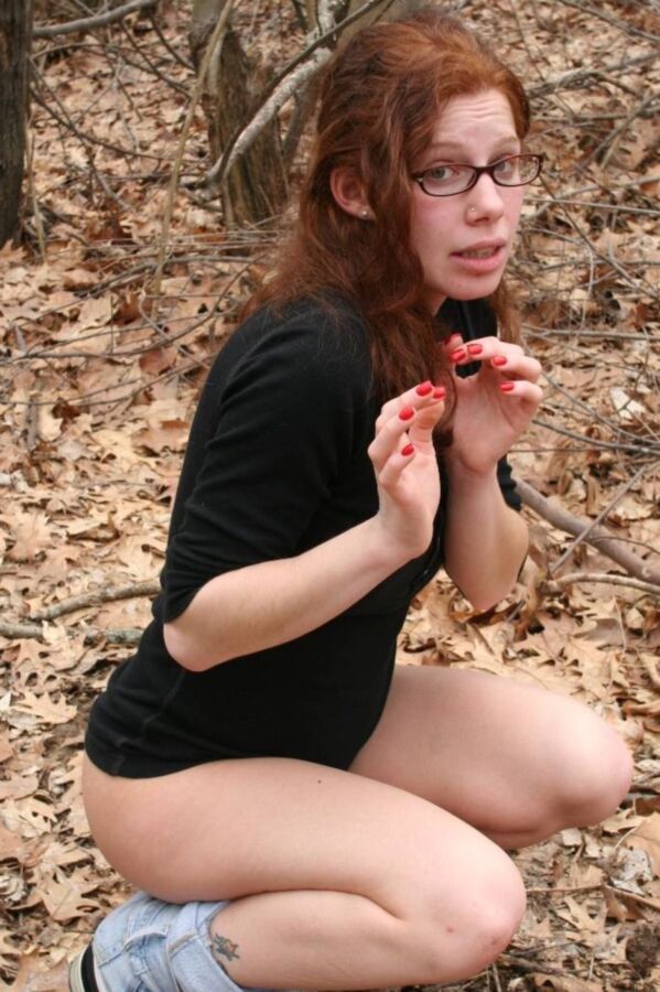 Hot redhead Stacie tied up in the woods  3 of 33 pics