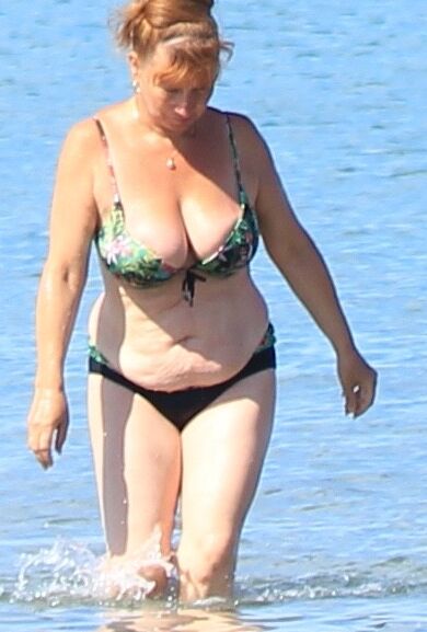 Voyeur mature in swimsuit  3 of 3 pics