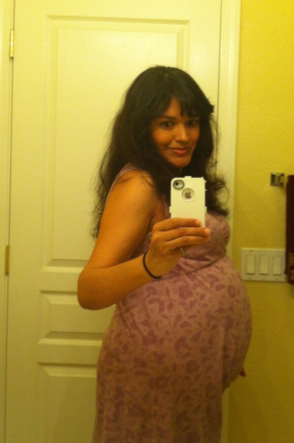 Preggo MILF Showing Off Her Curves 13 of 22 pics