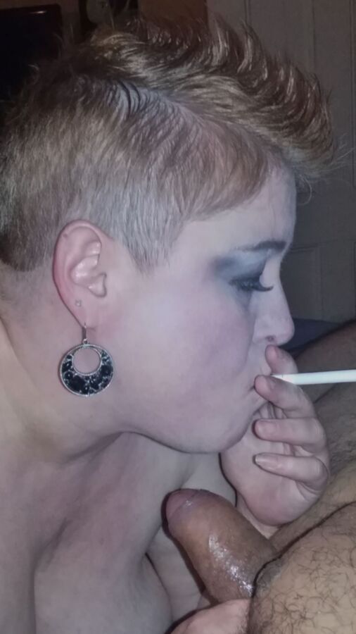 My Wife w/ Her Sexy Mohawk Smoking & Sucking My Uncut Cock! 20 of 30 pics