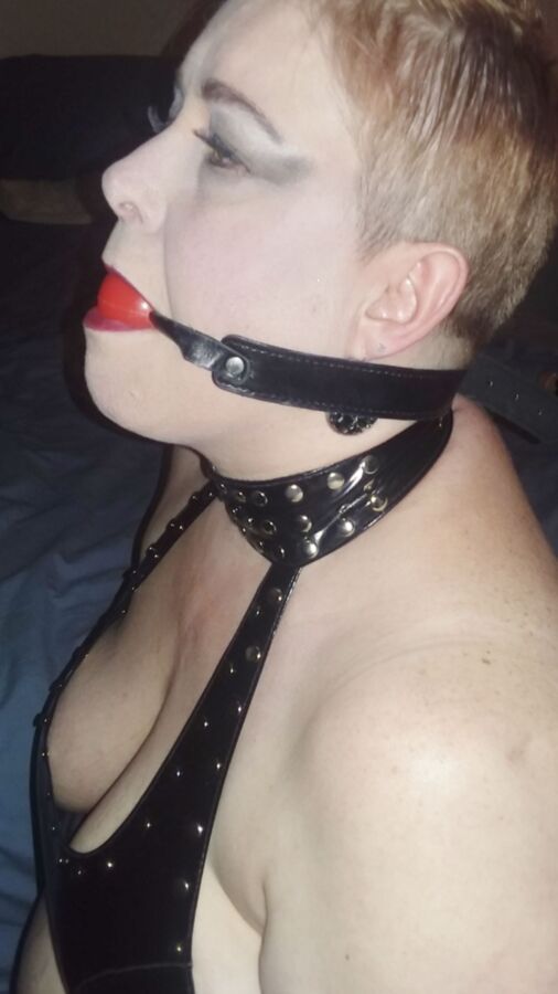 Mowhawked Wife In Vinyl Gets Choked & Ball Gagged 14 of 16 pics