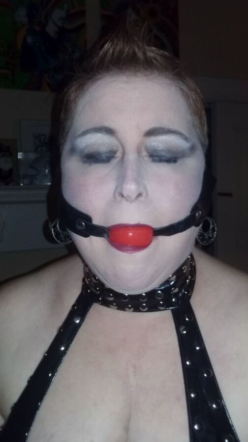 Mowhawked Wife In Vinyl Gets Choked & Ball Gagged 9 of 16 pics