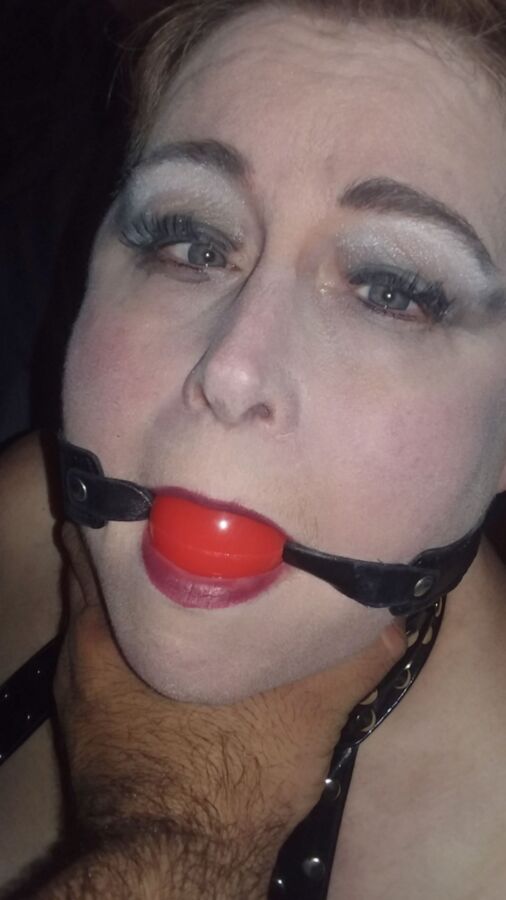 Mowhawked Wife In Vinyl Gets Choked & Ball Gagged 11 of 16 pics